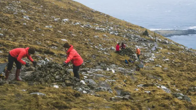 Brown Group members build cairns