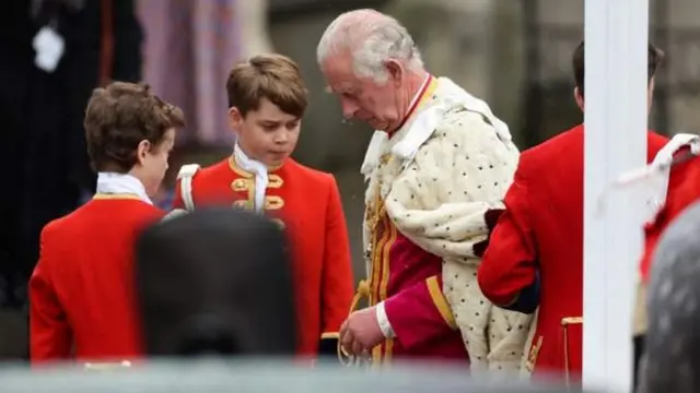Britain King Charles and Prince George stand outside Westminster Abbey