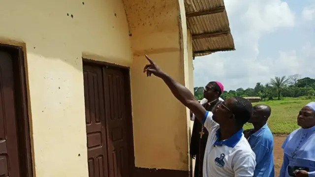 Di front of di Catholic church where dem kill di priest.