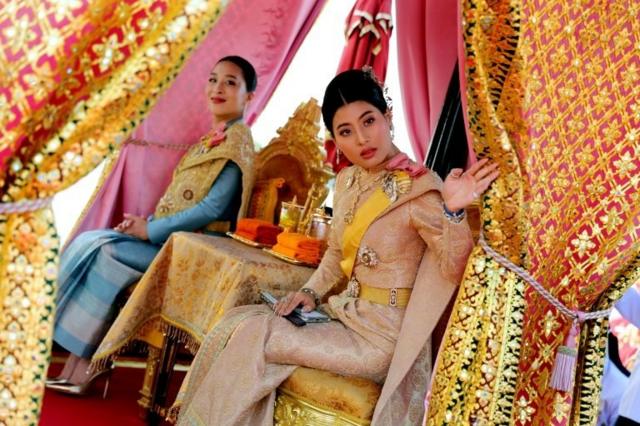 Thailand"s Princess Bajrakitiyabha and Princess Sirivannavari Nariratana take part in a royal barge river procession along the Chao Praya river as part of the year-long celebrations of his coronation in Bangkok