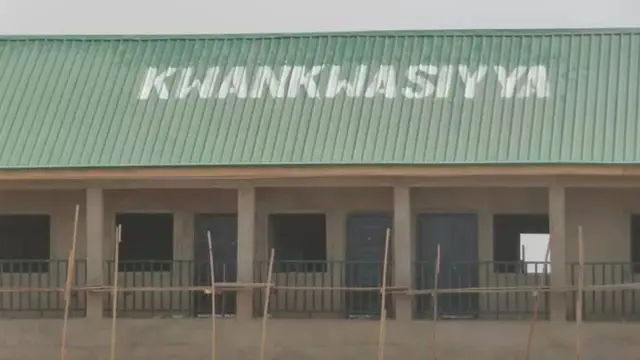 Buildings built during Mr Kwankwaso's second term as governor are emblazoned with the name of his Kwankwasiyya movement
