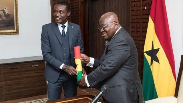 prosecutor being handed his baton of office by then president Nana Akufo-Addo
