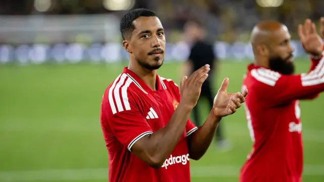 Youri Tielemans clapping as e greet Old Trafford fans during pre-season match