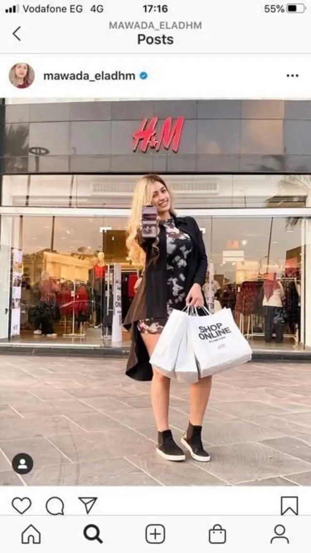 Mawada stands outside a shop in an Instagram post