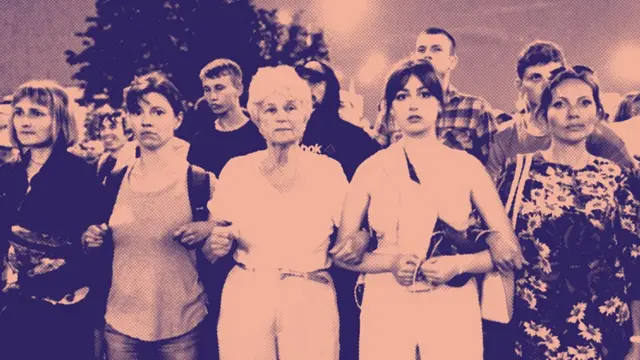 A human chain of female protesters of all ages stands with their arms linked at a post-election demonstration in Belarus capital, Minsk.