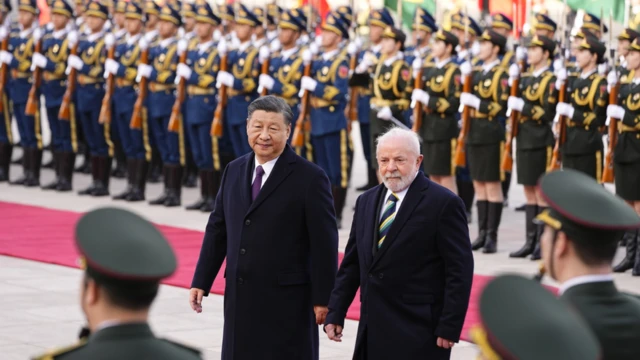 Brazilian President Luiz Inacio Lula da Silva inspects an honour guard with Chinese President Xi Jinping in Beijing in April 2023