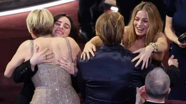 Barbie creators Greta Gerwig and Margot Robbie hug Billie Eilish and Finneas O'Connell afta dem win best original song for Barbie