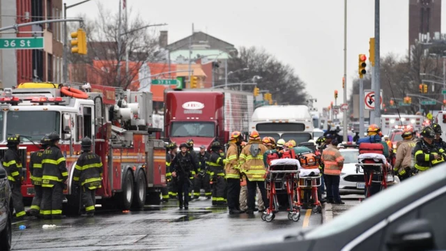 First responders crowd the streets near the subway station