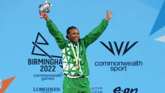 Adijat Adenike Olarinoye of Team Nigeria take part for di medal ceremony for Women Weightlifting 55kg Final on day two of di Birmingham 2022 Commonwealth Games 