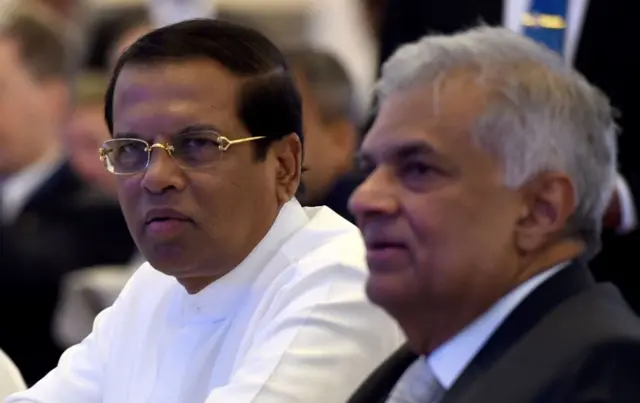 西裏塞納(左)突然宣佈罷免維克勒馬辛哈(右)