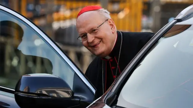 Cardinal Peter Erdo reacts as he enters a vehicle at the Vatican, following the death of Pope Francis, as seen from Rome, Italy, April 22, 2025