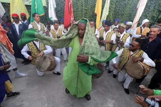 There is more action in Tunisia on the same day as the Istambali Art Culture Association performs at a show in Tunis called Mouldia, to celebrate the birthday of the Prophet Muhammad, known as Mawlid...