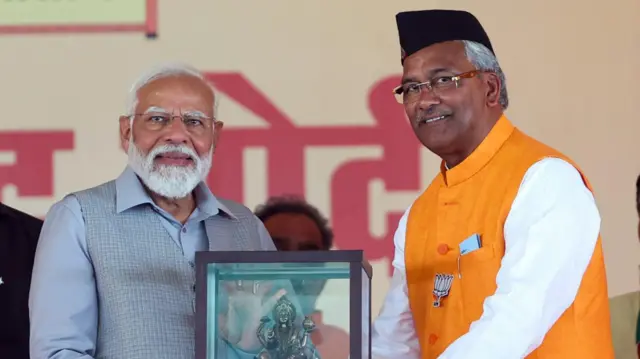 पीएम मोदी और त्रिवेंद्र सिंह रावत