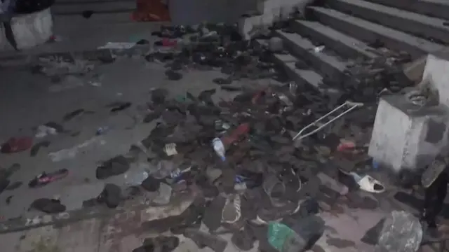 Plenty shoes dey for floor afta di crush