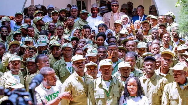 Nysc members with President Muhammadu Buhari and President Alpha Conde
