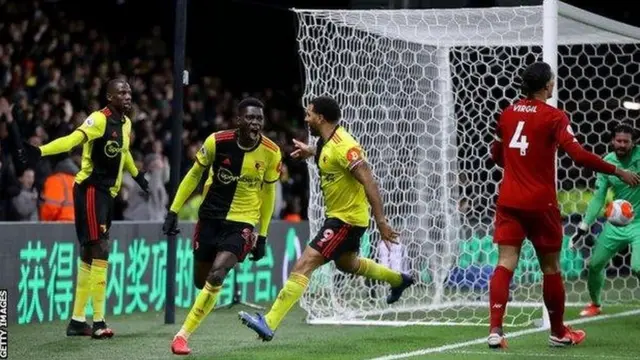 لاعبو واتفورد يحتفلون بأحد أهدافهم في ليفربول