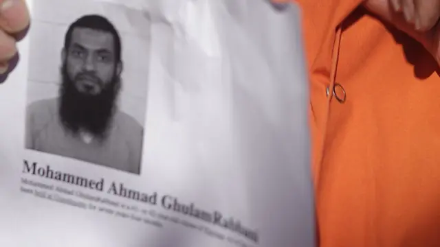 Una impresión con la foto de Abdul Rabbani