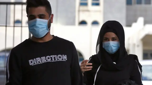 people in masks in Beirut