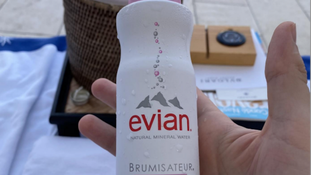 Kivimaki holding a bottle of water