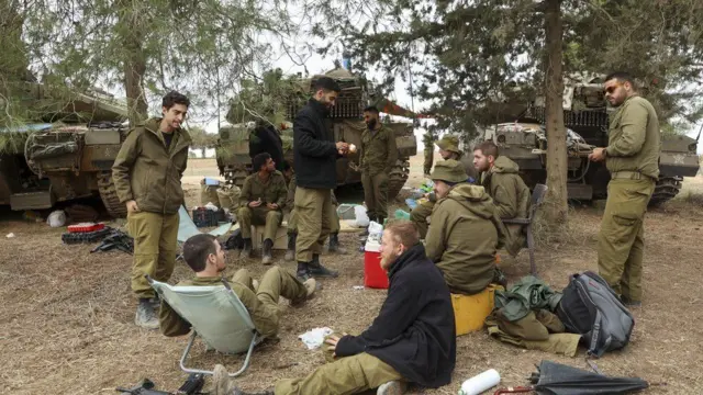 Israeli troops relax during the recent truce in Gaza