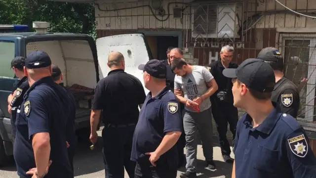 Ивана Приходько выводят из зала суда