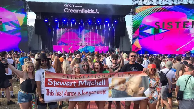 Banner held in front of stage at Creamfields