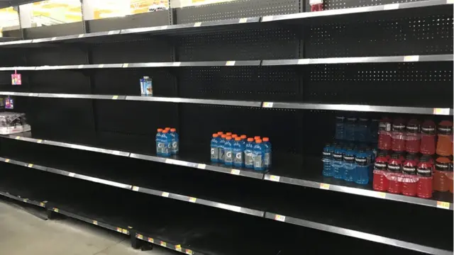 Bare shelves at a Walmart in Houston
