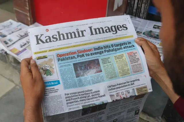 A man reads a newspaper with the front-page news of ''Operation Sindoor'' in Srinagar, Jammu and Kashmir, on May 8, 2025. 