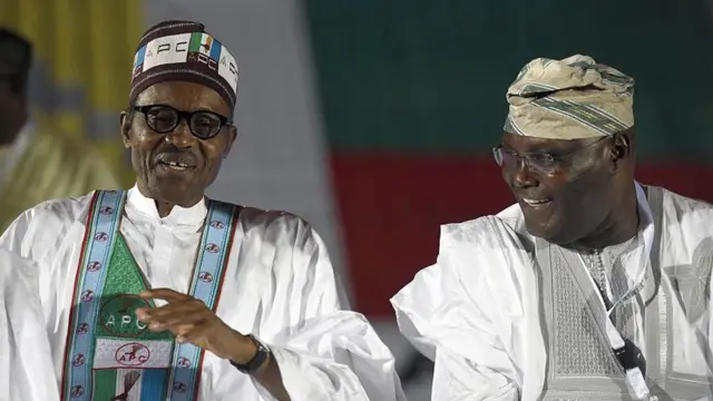 President Muhammadu Buhari dey tok to Former Nigeria vice president Atiku Abubakar