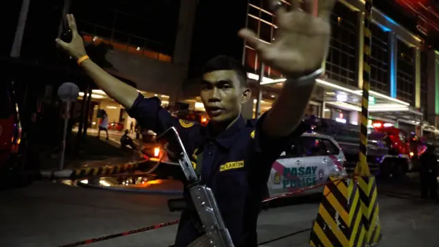 Сотрудник спецслужб на месте атаки отеля на Филиппинах