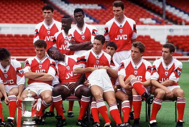 The Arsenal team - including Jimmy Carter - pose for a photo in August 1993