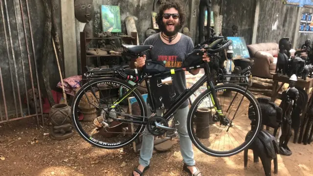 In December 2017 in Guinea, he looked at local crafts...