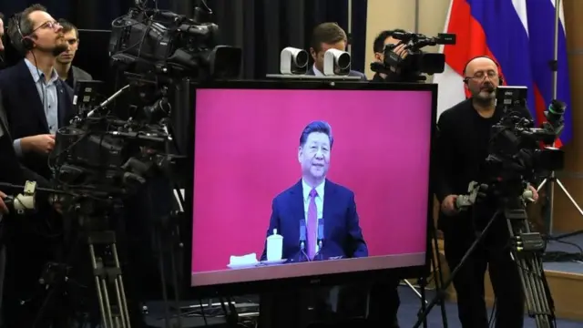 Xi Jinping, presidentefutebol goianoChina, participando por videoconferência