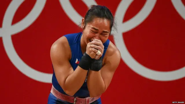 Hidilyn Diaz celebrates an emotional win at the Tokyo 2020 Olympics.