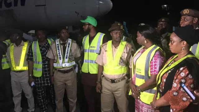 Abike Dabiri with Nigerian officials while receiving the returnees from South Africa
