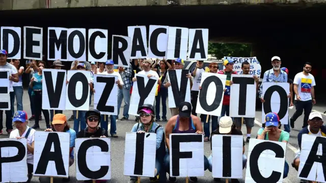Opposition activists protest in Caracas