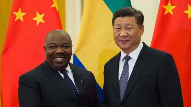 Gabon"s President Ali Bongo Ondimba (L) shakes hands with China"s President Xi Jinping (R) before their bilateral meeting at the Great Hall of the People, Beijing, China, 01 September 2018.
