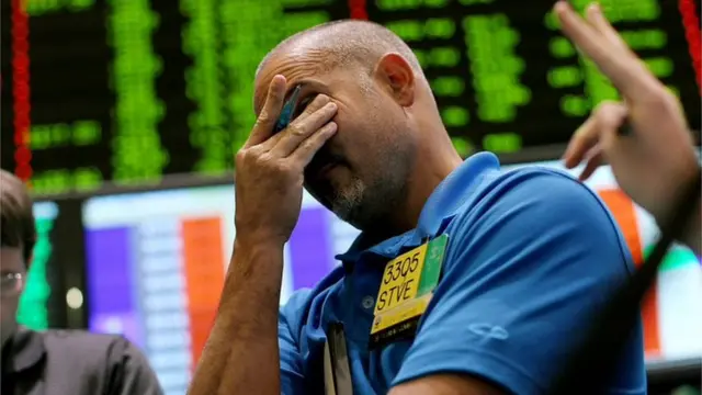 A trader at the New York Sotck Exchange