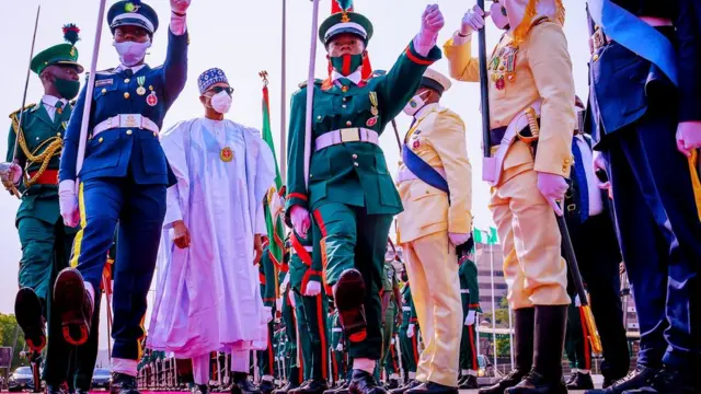 President Buhari match with soldiers
