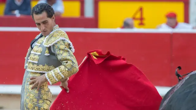 Spanish bullfighter Ivan Fandino as he fights a bull in a bullfight in the Fiesta de San FermÃ­n in Pamplona, northern Spain, 10 July 2015