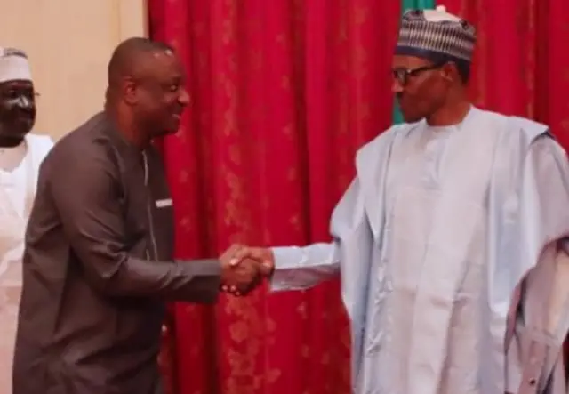 Festus Keyamo dey shake President Buhari hand