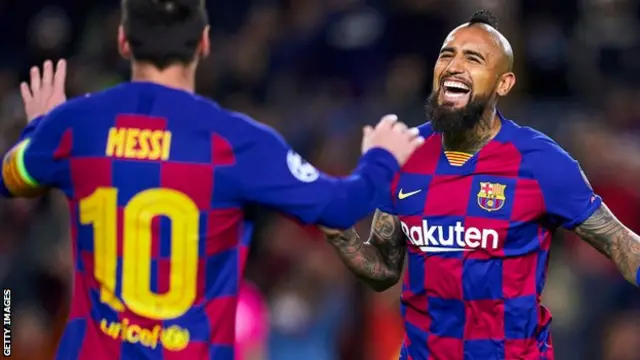 Arturo Vidal and Lionel Messi