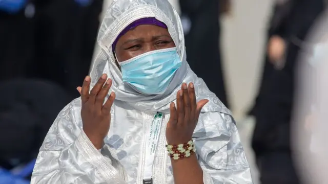 A Muslim pilgrim prays at Mecca's Grand Mosque during Hajj (31 July 2020)