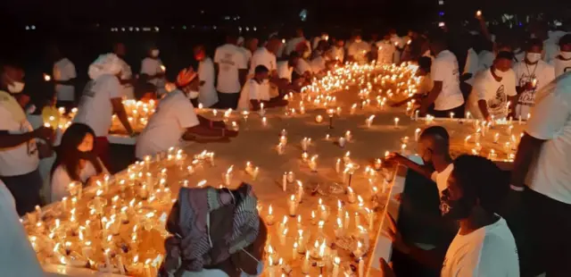 "Prophet TB Joshua burial": Temitope Balogun Joshua wife Evelyn Joshua lead 'funeral candlelight procession' by [Synagogue Church, Emmanuel TV]