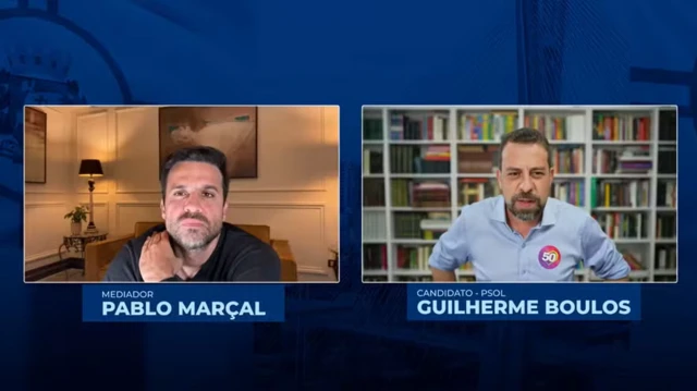 Print de uma live no canal de YouTube de Pablo Maral; a tela est divida e mostra ele e Guilherme Boulos em debate