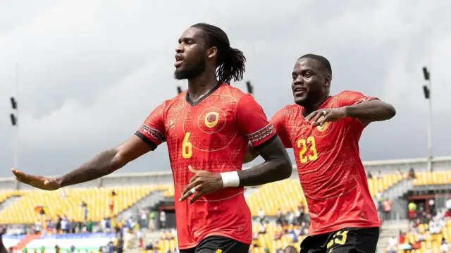 Angola's Felicio Mendes Joao Milson celebrates his goal with team-mates after scoring against Central African Republic in Douala in June 2023