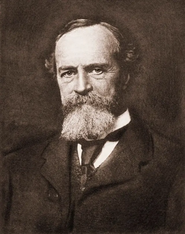 Retrato de William James, homem barbudo e de roupa formal