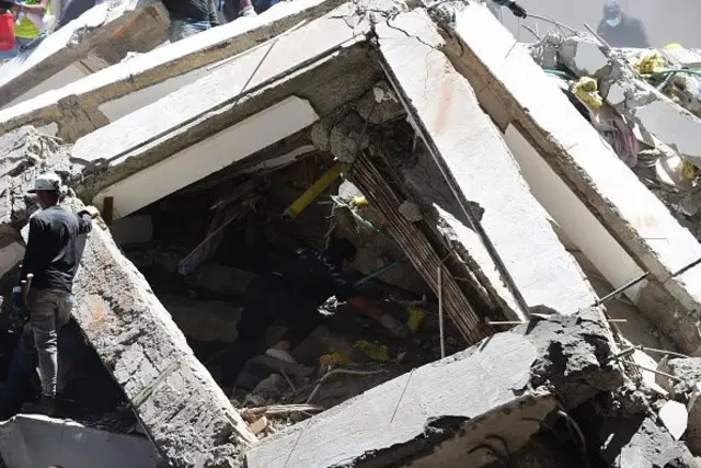 Emergency crews carry out search, rescue and evacuation operations across Cali after a magnitude 7.4 earthquake struck western Colombia, on August 10, 2026 in Cali, Colombia. Preliminary reports indicate that several structures collapsed, buildings and roads were damaged, and some public services were temporarily disrupted. Hospitals activated emergency plans to treat the injured, while technical teams began assessing damaged buildings as authorities warned residents to avoid unsafe structures and remain alert for aftershocks. (Photo by Edwin Rodriguez Pipicano/Anadolu via Getty Images)