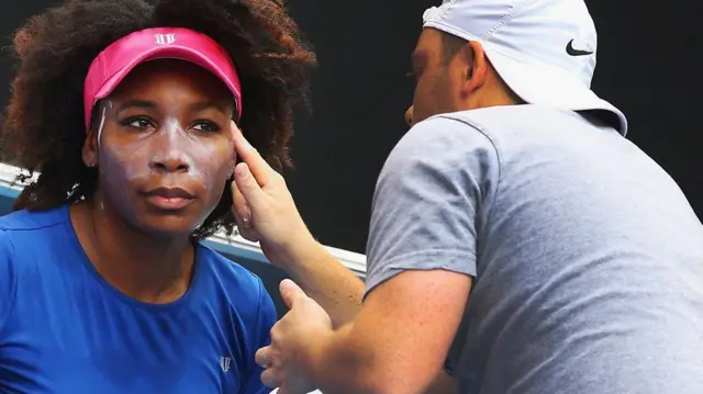 شخص أسود البشرة يستخدم واقيا من الشمس