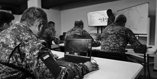 Військові сидять за столами